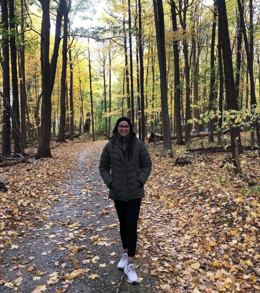 Ruth, watercolor artist, walking in an autumn forest
